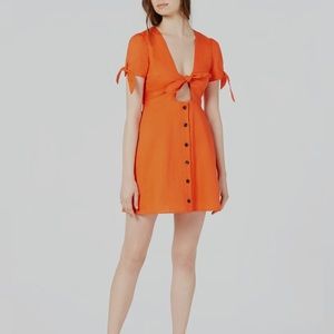 Orange peep front tie dress